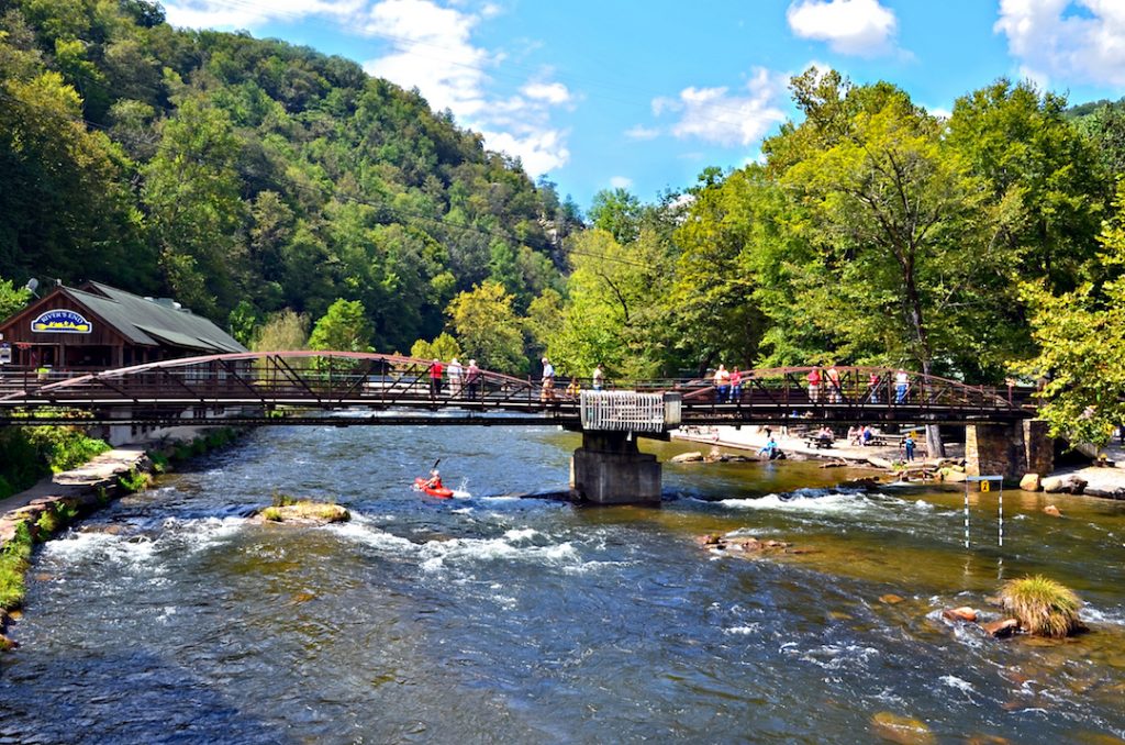 BRYSON CITY, NC, USA - SEPT 9: River's End Restaurant and bridge over the Nantahala River, Sept, 9, 2012. A popular tourist area for hiking and water sports in the Smoky Mountains.